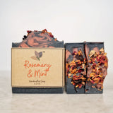 Nature's Natural Lather handcrafted cold process vegan Rosemary and Mint Essential Oil Scented bar soap made with all natural plant based vegan ingredients including activated charcoal, kaolin clay, dried rose petals, and moroccan red clay. Great on sensitive skin, dry skin, and combination skin with problems like eczema, acne, psoriasis and more.  Edit alt text