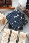 Nature's Natural Lather vegan handcrafted traditionally made hot process soap with Activated Charcoal,Kaolin Clay,  Peppermint Essential Oil, and Exfoliating Oatmeal for a luxurious lather perfect for dry, sensitive, and oily skin types. Tough on dirt, grime, excess oil, sebum, talking pimples & acne, and aromatherapeutic.