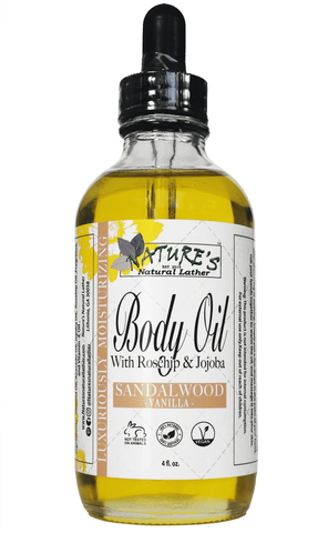 Nature's Natural Lather vegan, handcrafted, natural, and sustainable liquid sandalwood vanilla body oil with vitamin e oil, rosehip oil, jojoba oil, essential oils, almond oil, and avocado oil. Non oily application and silk like feel with truly nourishing and hydrating benefits thanks to naturally concentrated vitamin c, d, and antioxidants. Natural body and facial moisturizer. Edit alt text Edit alt text  Edit alt text