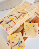 Nature's Natural Lather Sweet Orange Lemongrass Essential Oil scented Soap Bar made with all natural plant based ingredients including red clay, kaolin clay, activated charcoal, shea butter, cocoa butter and more and scented with Tea Tree Essential Oil and Sweet Orange Essential Oil. Plant Based Vegan Soap Bars For Sensitive Skin.