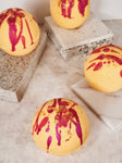 Nature's Natural Lather handcrafted Mango Guava scented bath bomb made with all natural vegan ingredients including kaolin clay, sweet almond oil, and more for a luxurious feel on sensitive skin.