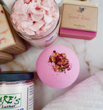 Nature's Natural Lather Sweet Rose scented bath bomb for Valentine's Day made without cornstarch and perfect for women. Handcrafted with natural vegan oils & butters, kaolin clay, and more vegan ingredients for self care bath time.  Edit alt text